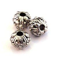 Perle métal ornée 10mm argent vieilli