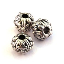 Perle métal ornée 10mm argent vieilli