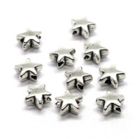 Perles étoile en métal argent vieilli 6mm x10