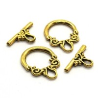 Fermoirs toggle volutes doré x2