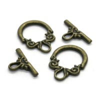 Fermoirs toggle volutes bronze x2