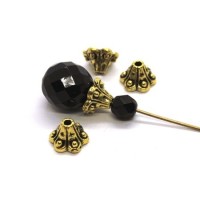 Perles coupelles fleur dorées 9mm