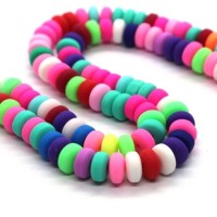 Assortiment de perles rondelles en Fimo