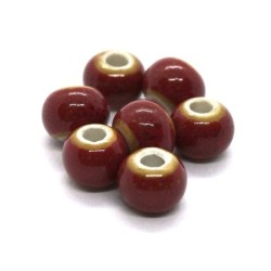 Perle céramique ronde 6mm rouge moucheté