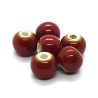 Perle céramique ronde 8mm rouge moucheté