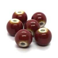 Perle céramique ronde 10mm rouge moucheté
