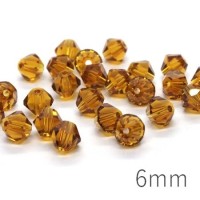 25 perles toupies en verre 6mm topaze AAA