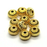 Perles rondes aplaties striées métal dorées x10
