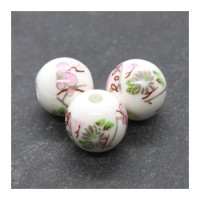 Perle céramique fleurie rose clair 12mm