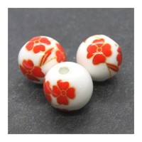Perle céramique fleurie rouge vif 12mm
