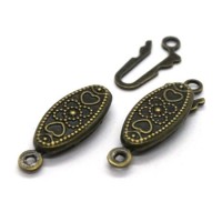 4 Fermoirs cliquet navette bronze 20x7mm