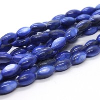 15 Perles en coquillage grain de riz 9mm bleu