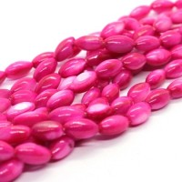 15 Perles en coquillage grain de riz 9mm fuchsia