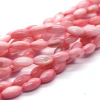 15 Perles en coquillage grain de riz 9mm rose