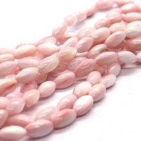15 Perles en coquillage grain de riz 9mm rose clair