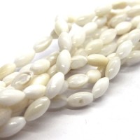 15 Perles en coquillage grain de riz 9mm naturel