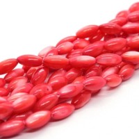 15 Perles en coquillage grain de riz 9mm saumon