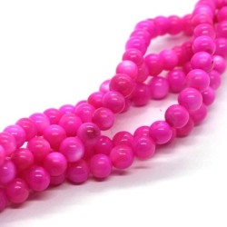 Perles rondes en coquillage 4mm fuchsia x25