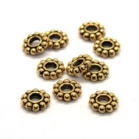 Perles métal rondelles roues dorées 7mm