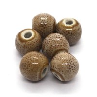 Perle céramique ronde 10mm beige moucheté