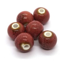 Perle céramique ronde 10mm saumon moucheté