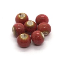 Perle céramique ronde 6mm saumon moucheté