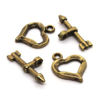 2 Fermoirs toggle coeur doré antique