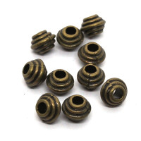 10 Perles métal toupie bronze 5mm