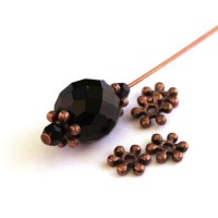 Perle rondelle fleur cuivre