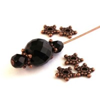 Perle rondelle étoile cuivre