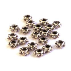 Perle rondelle à picots en métal