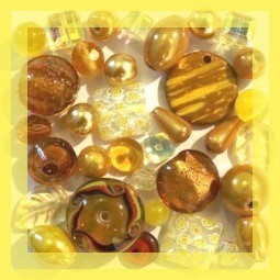 Perles couleur jaunes, or et topaze
